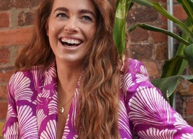 Happy person with long hair at boo.colourist - East London, London, England, GB.