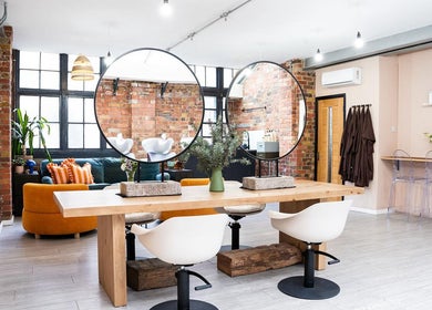 Spacious and stylish interior of Boo.colourist - East London in London, England, GB with elegant decor.