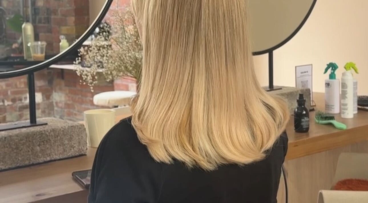 Explore chic blonde styling at boo.colourist | East London, London, England, GB with modern salon interiors.