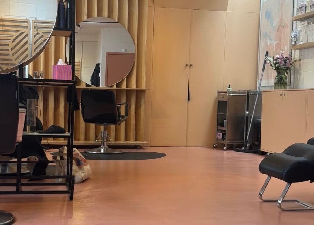 Modern salon interior of boo.colourist | East London, located in London, England, GB, showcasing chic design.