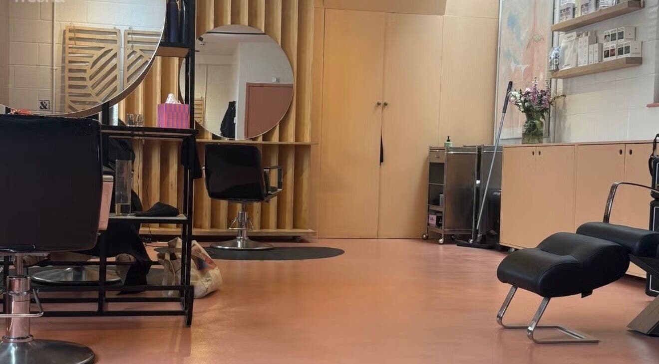 Modern salon interior of boo.colourist | East London, located in London, England, GB, showcasing chic design.