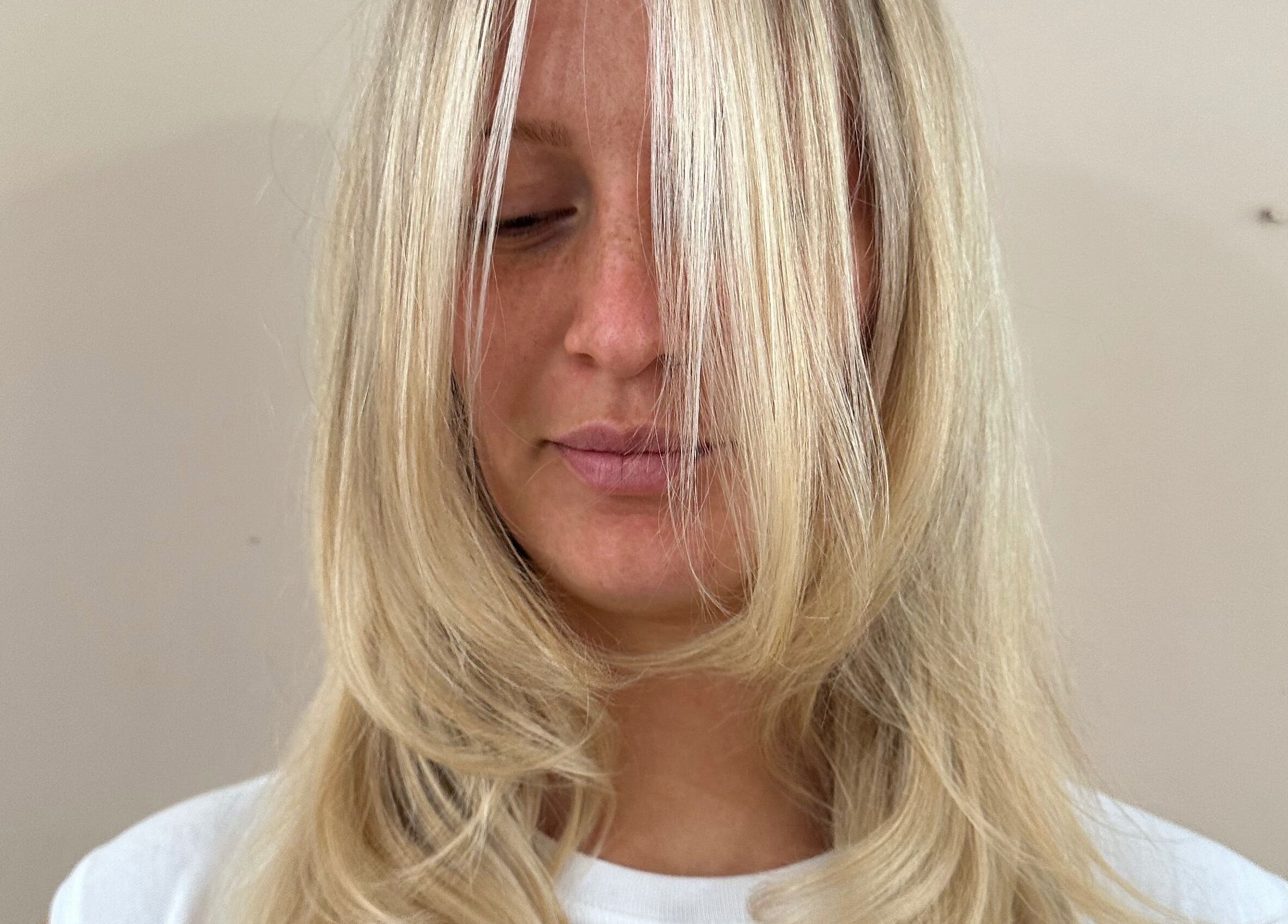 Close-up of sleek blonde hairstyle at boo.colourist | East London, London, England, GB.