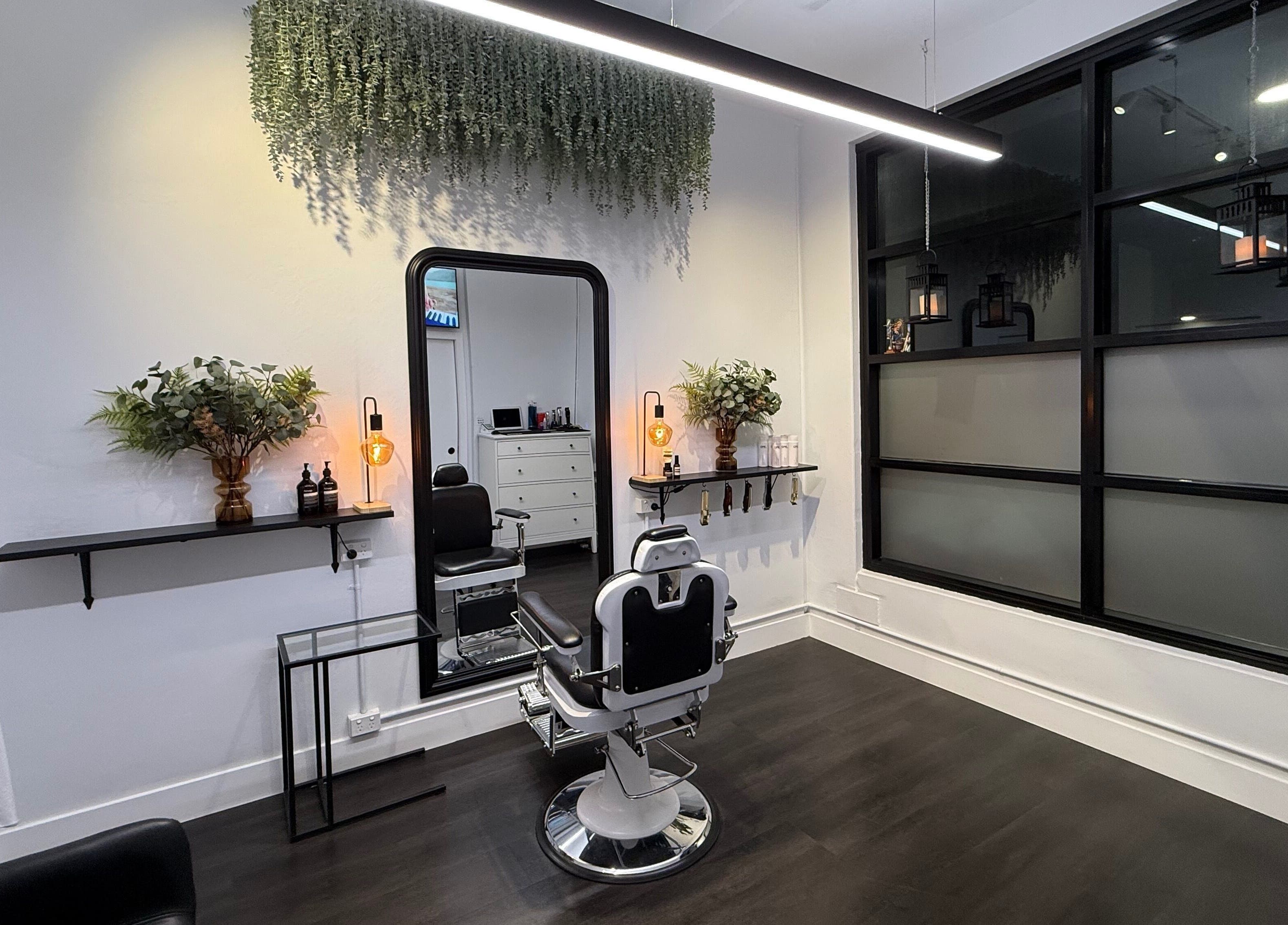 Modern salon interior at St Louis and Co, Kingsgrove, New South Wales, AU with stylish barber chair and decor.