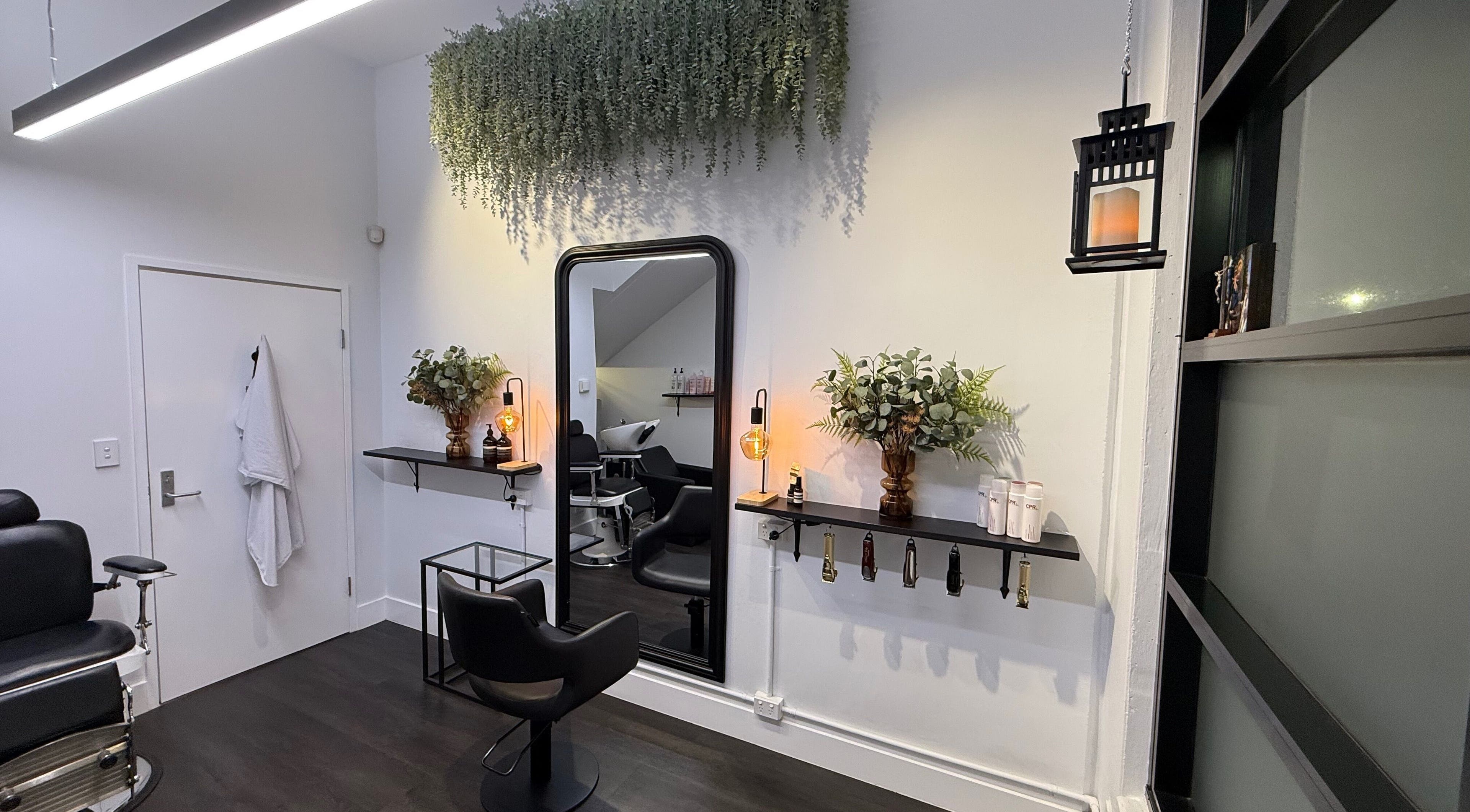 Chic salon interior at St Louis and Co, Kingsgrove, New South Wales, AU with modern decor and styling stations.