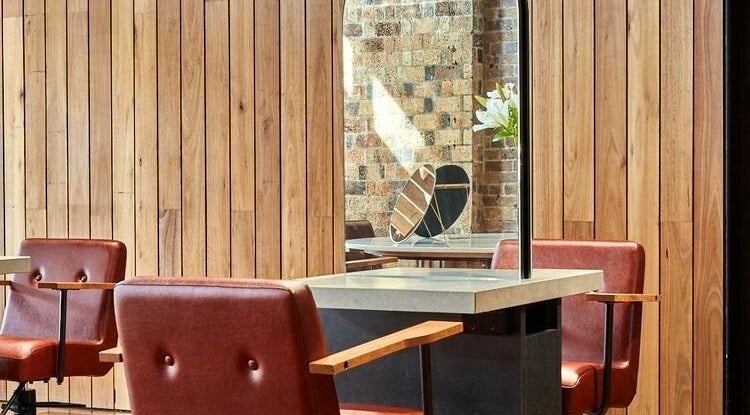 Stylish salon chairs and mirrors at Ella&Jade Woolloongabba, Woolloongabba, Queensland, AU.