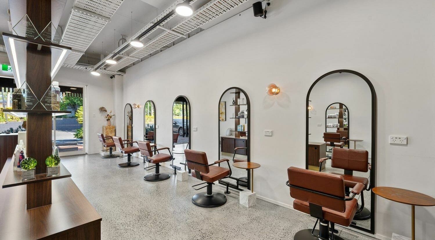 Modern salon chairs and mirrors at Ella & Jade Algester in Calamvale, Queensland, AU.