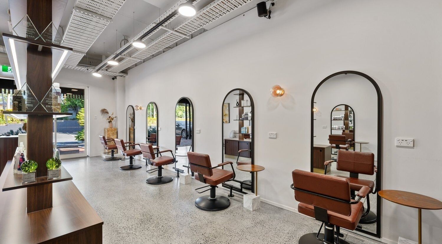 Elegant salon chairs at Ella & Jade Algester, Calamvale, Queensland, AU, showcasing modern beauty design.