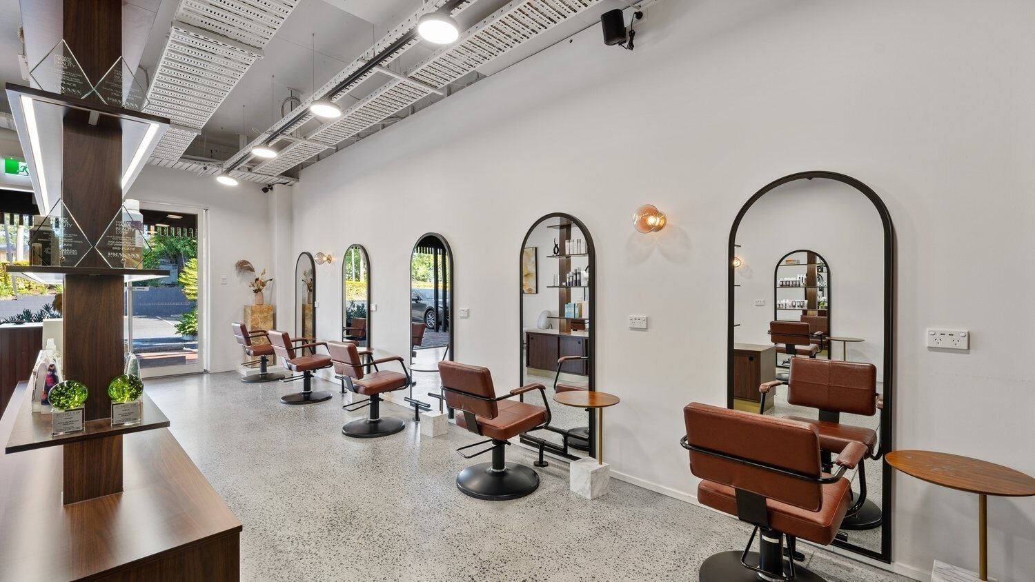 Elegant salon chairs at Ella & Jade Algester, Calamvale, Queensland, AU, showcasing modern beauty design.