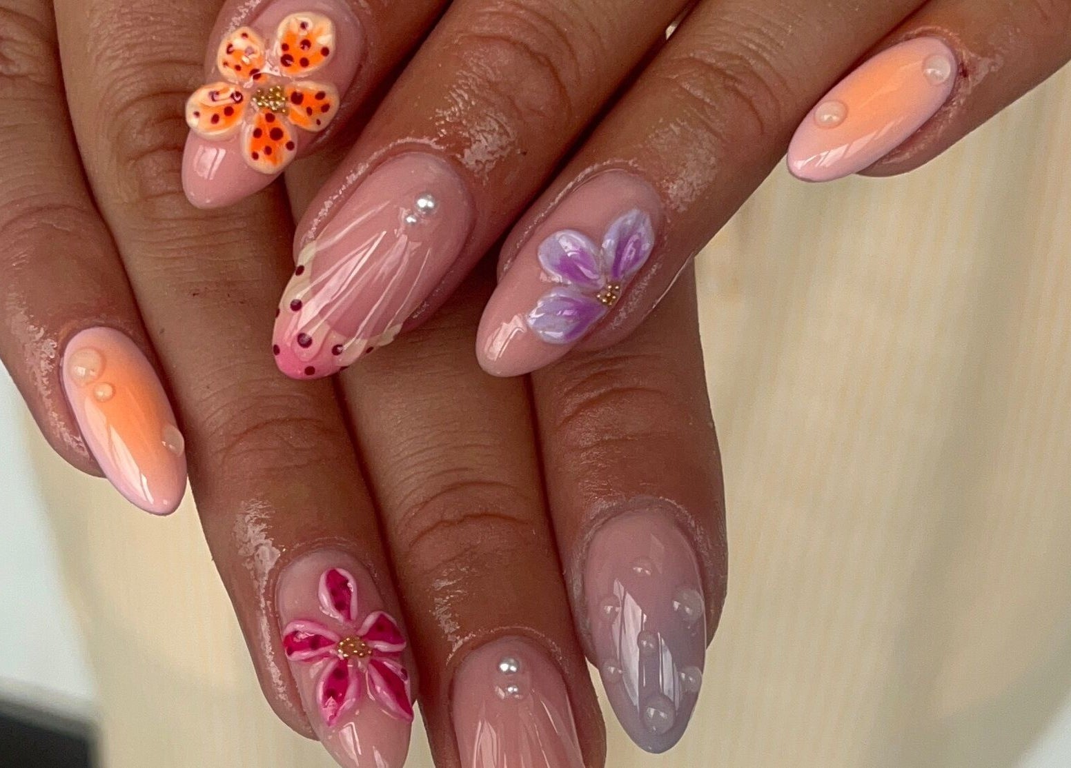 Stunning floral nail design at Gels by Grace, Sunderland, England, GB. Perfectly manicured hands.