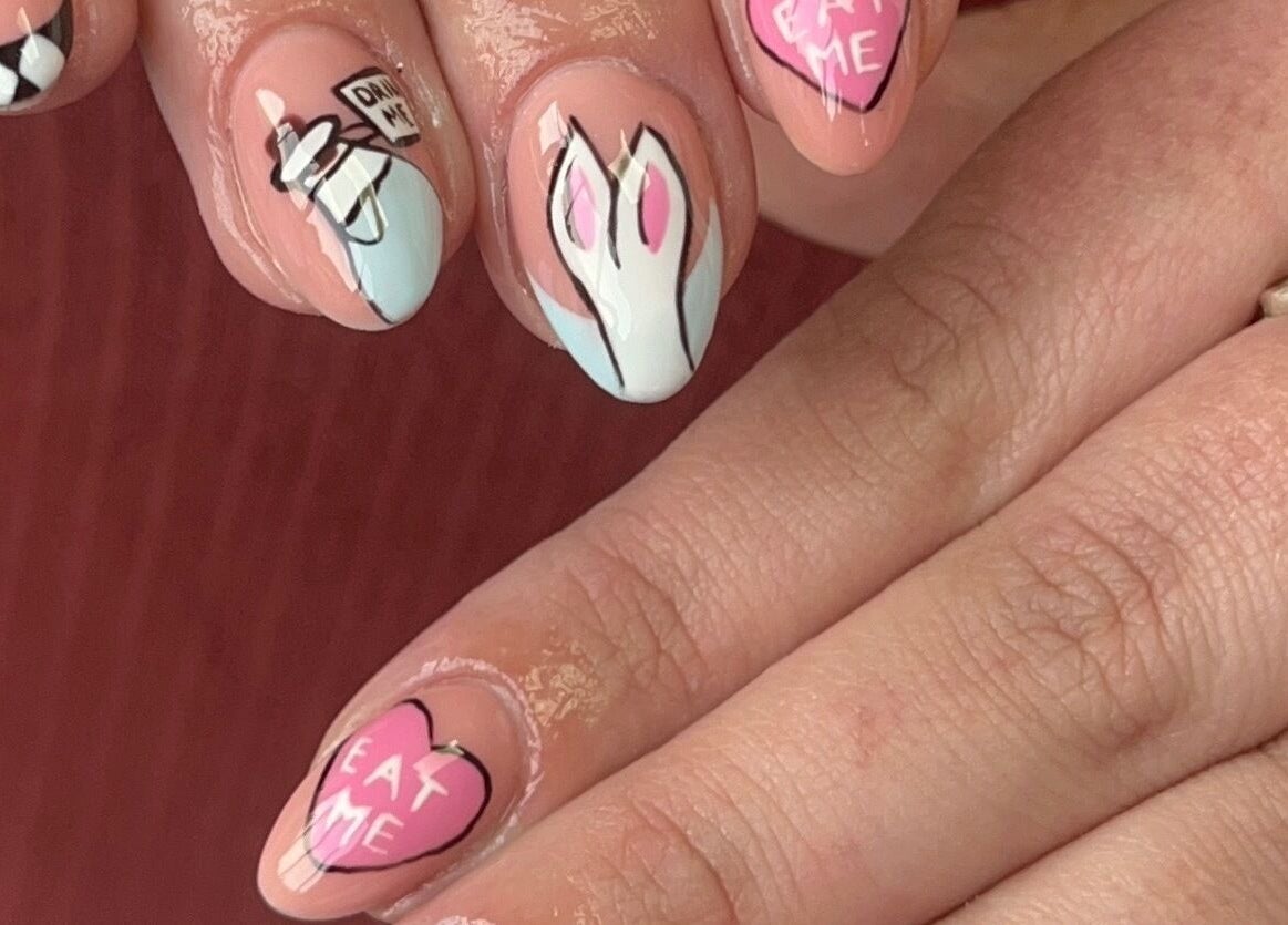 Whimsical nail art at Gels by Grace in Sunderland, England, GB, featuring playful designs like 'Eat Me' hearts.