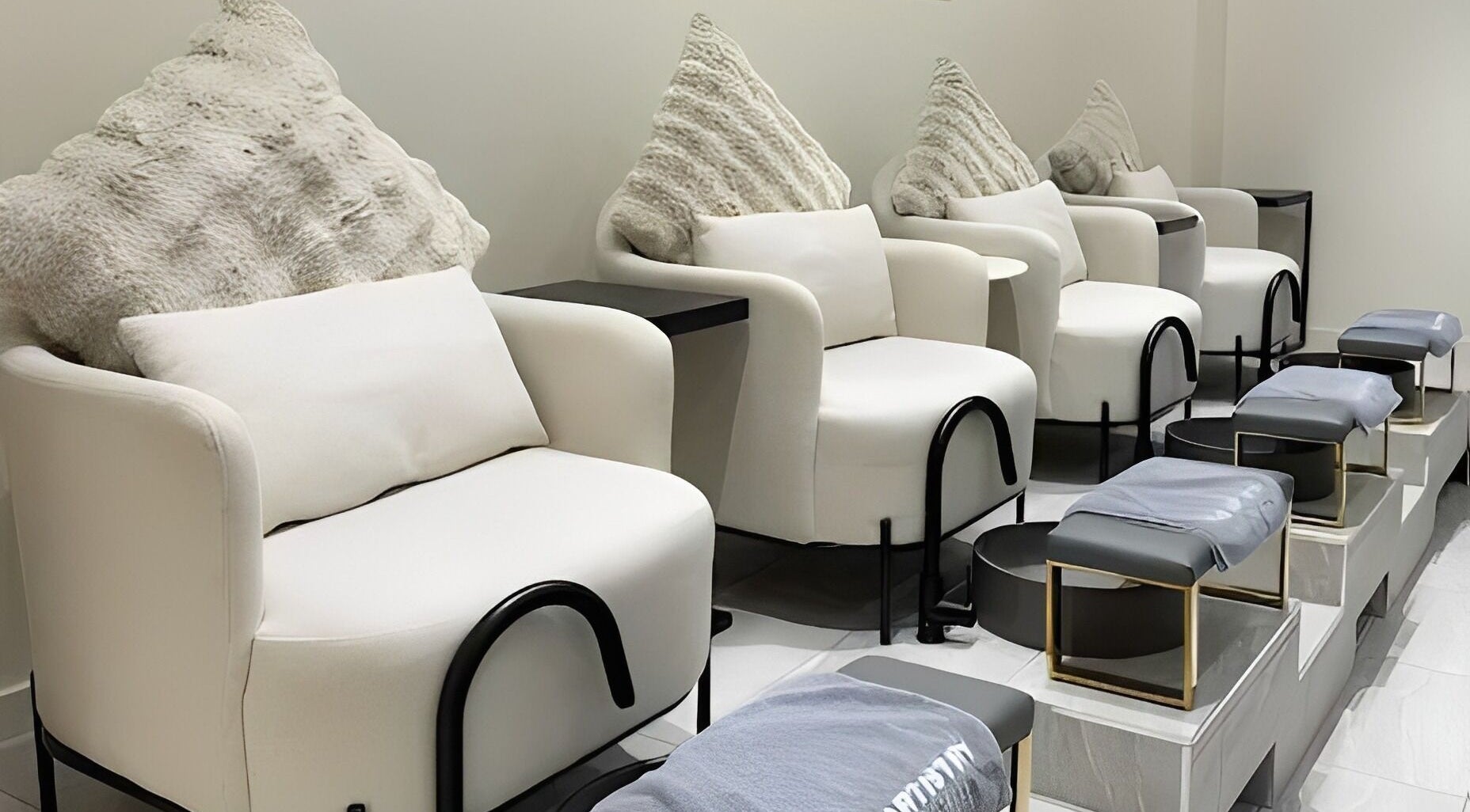 Plush pedicure chairs at The Artistry Sydney, Castle Hill, New South Wales, AU, offering luxury relaxation.