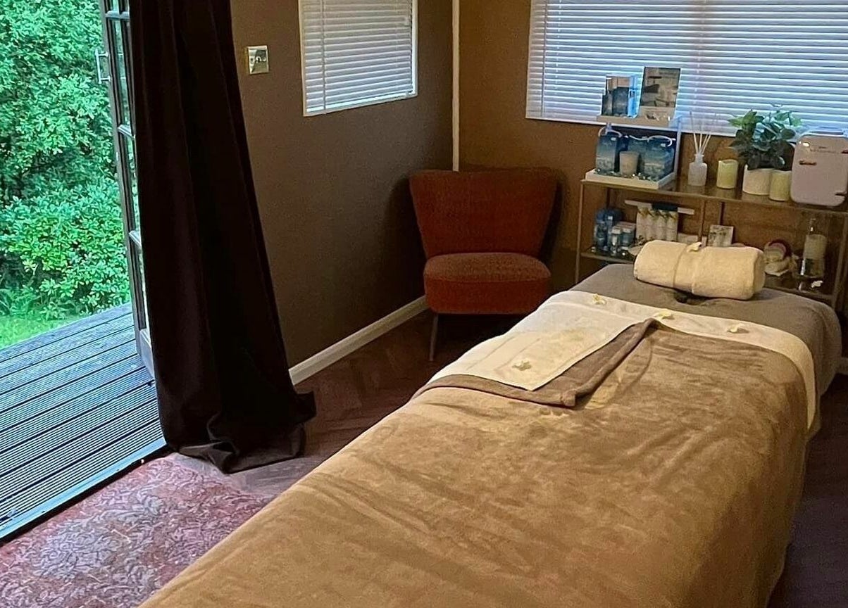 Relaxing view from Tranquility Treatment Room, Whitworth, England, GB showcasing a serene treatment bed.