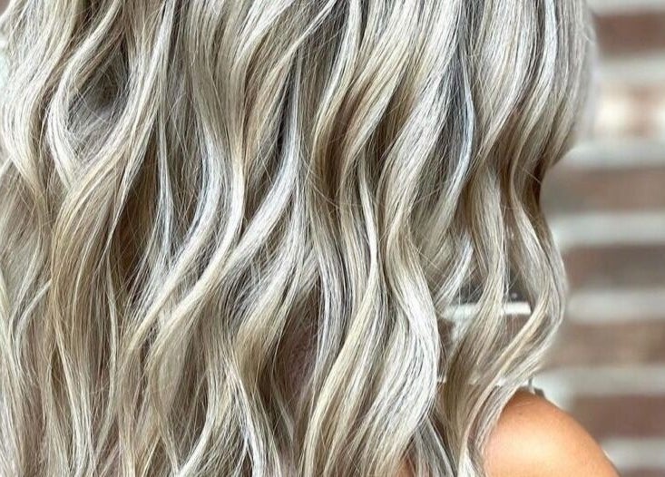 Elegant blonde waves styled at La Belle Vie Salon and Spa in Pleasant Grove, Utah, US.