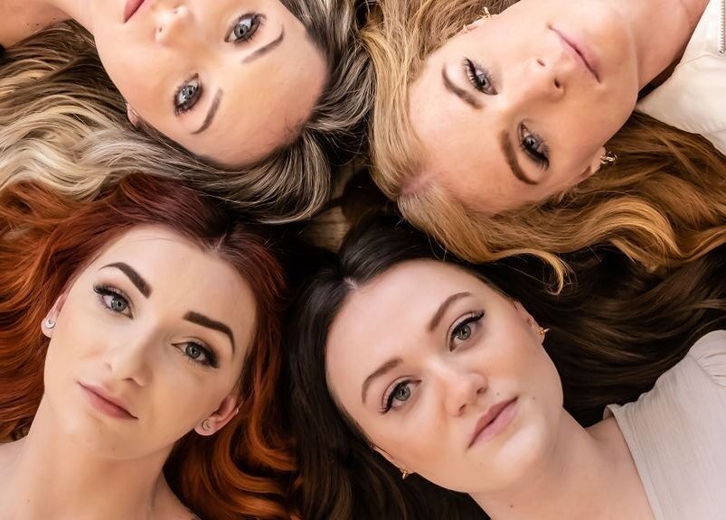 Four models with styled hair at La Belle Vie Salon and Spa in Pleasant Grove, Utah, US.