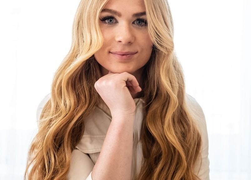 Woman with long, wavy blonde hair at La Belle Vie Salon and Spa, Pleasant Grove, Utah, US.