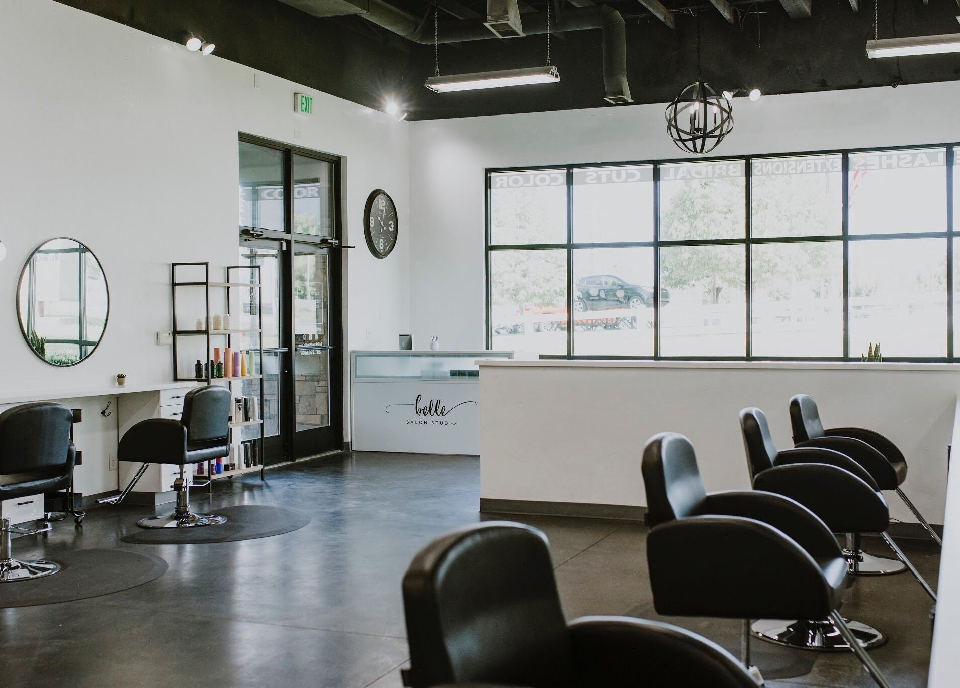 Interior of West Ivie Collective Beauty Lounge in Lindon, Utah, featuring stylish hair stations and mirrors.