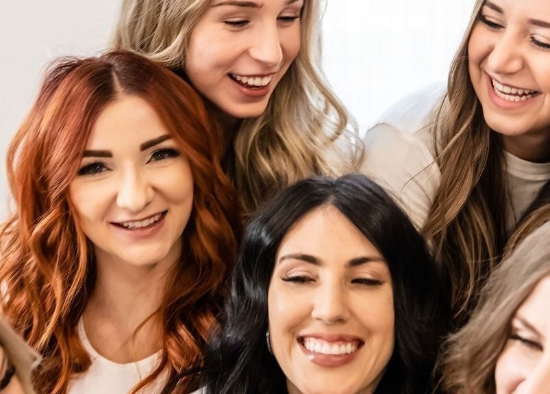 Happy group enjoying beauty session at West Ivie Collective Beauty Lounge in Lindon, Utah, US.