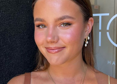 Close-up of a person with radiant skin, perfect for Spring Racing Carnival Bookings - PRAHRAN, Prahran, Victoria, AU.