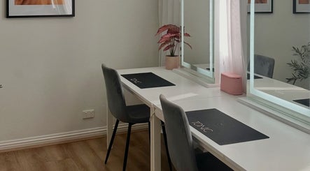 Elegant vanity setup at Tonic Studio - Hair & Makeup, Prahran, Victoria, AU, featuring sleek design and mirrors.