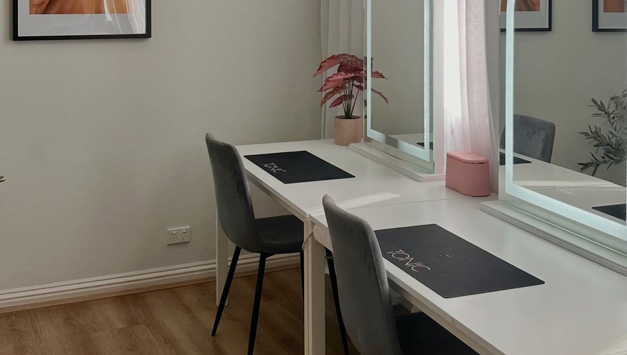 Modern beauty workstation at Tonic Studio - Hair & Makeup in Prahran, Victoria, AU with mirrors and chairs.