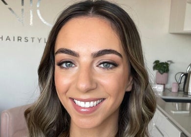 Smiling client showcasing makeup at Tonic Studio - Hair & Makeup in Prahran, Victoria, AU.