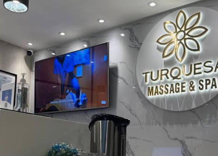 Turquesa Massage and Spa reception area in Makati, Metro Manila, PH with logo and elegant decor.