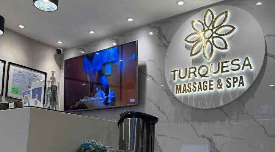 Turquesa Massage and Spa reception area in Makati, Metro Manila, PH with logo and elegant decor.