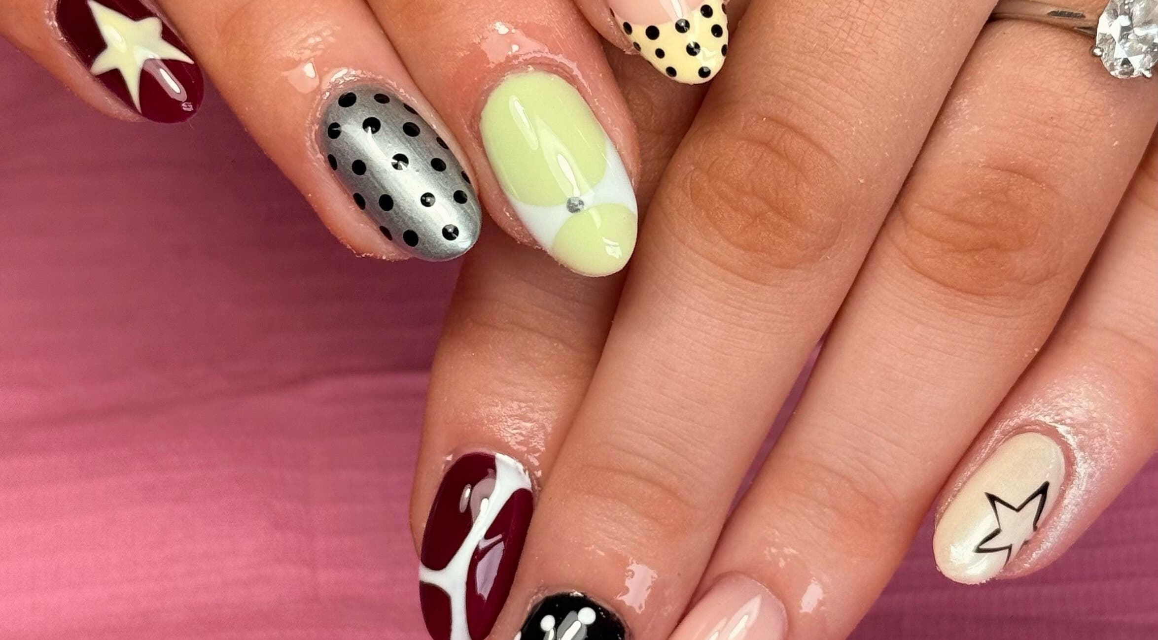 Stylish polka dot nail art at Beauty by Lauren F, Belfast, Northern Ireland, GB.