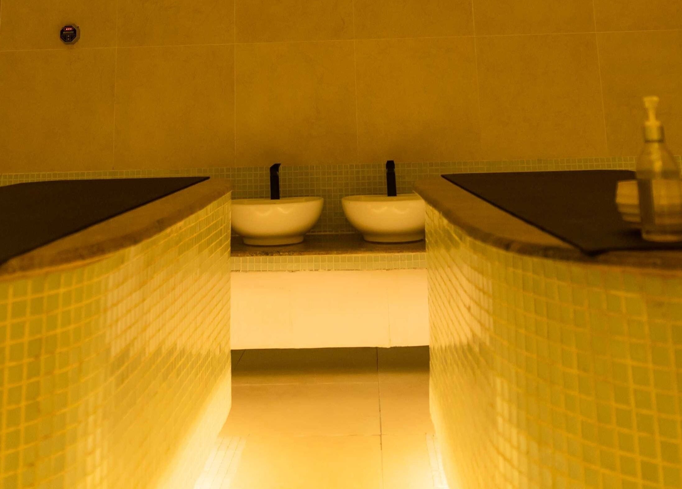 Calm wash area setup at The Medspa at Rj4, Lagos, Lagos, NG, featuring twin basins with cozy lighting.