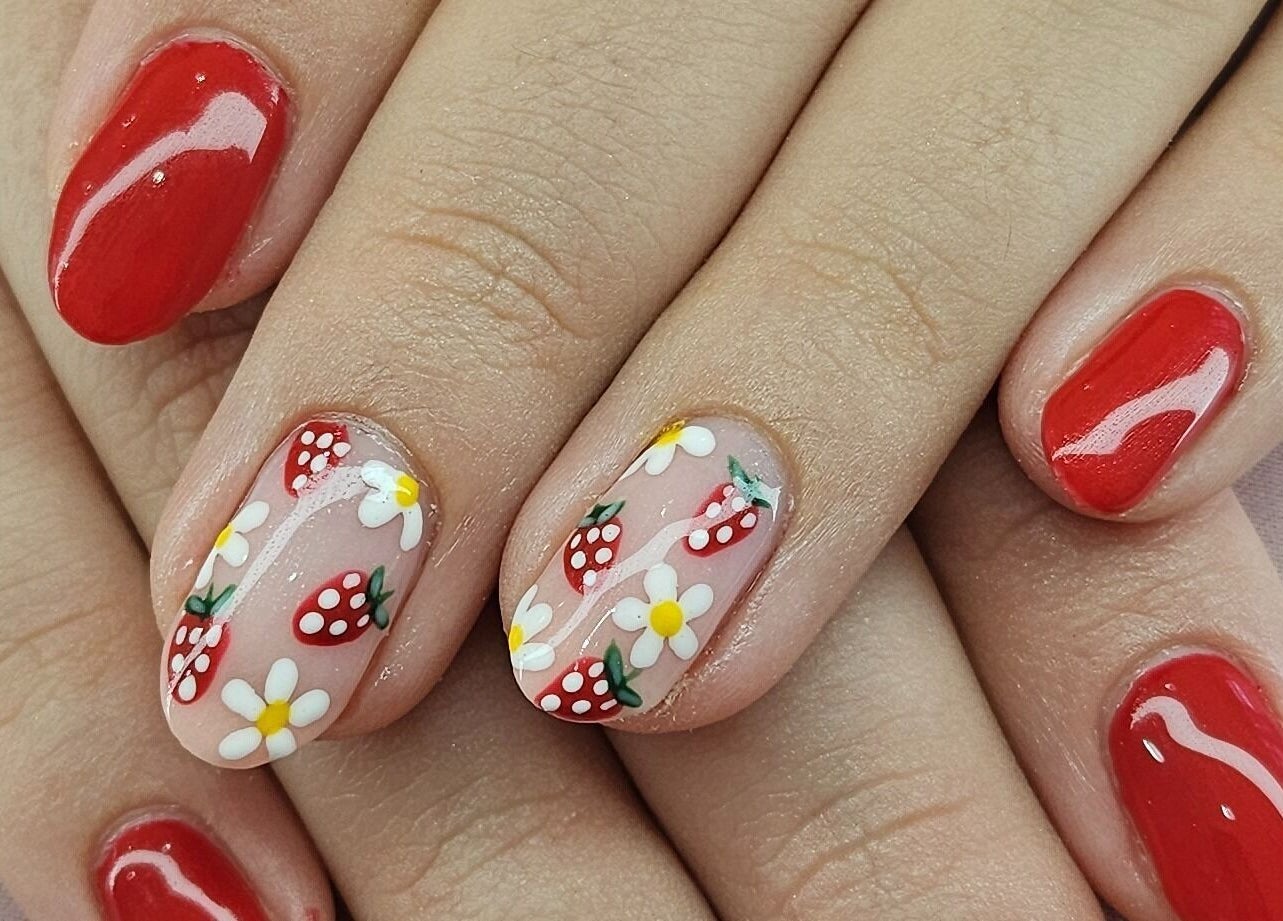 Vibrant strawberry nail art at Tamlyn Artistry in Waterfall, Kwazulu-natal, ZA. Perfect for fresh summer vibes.