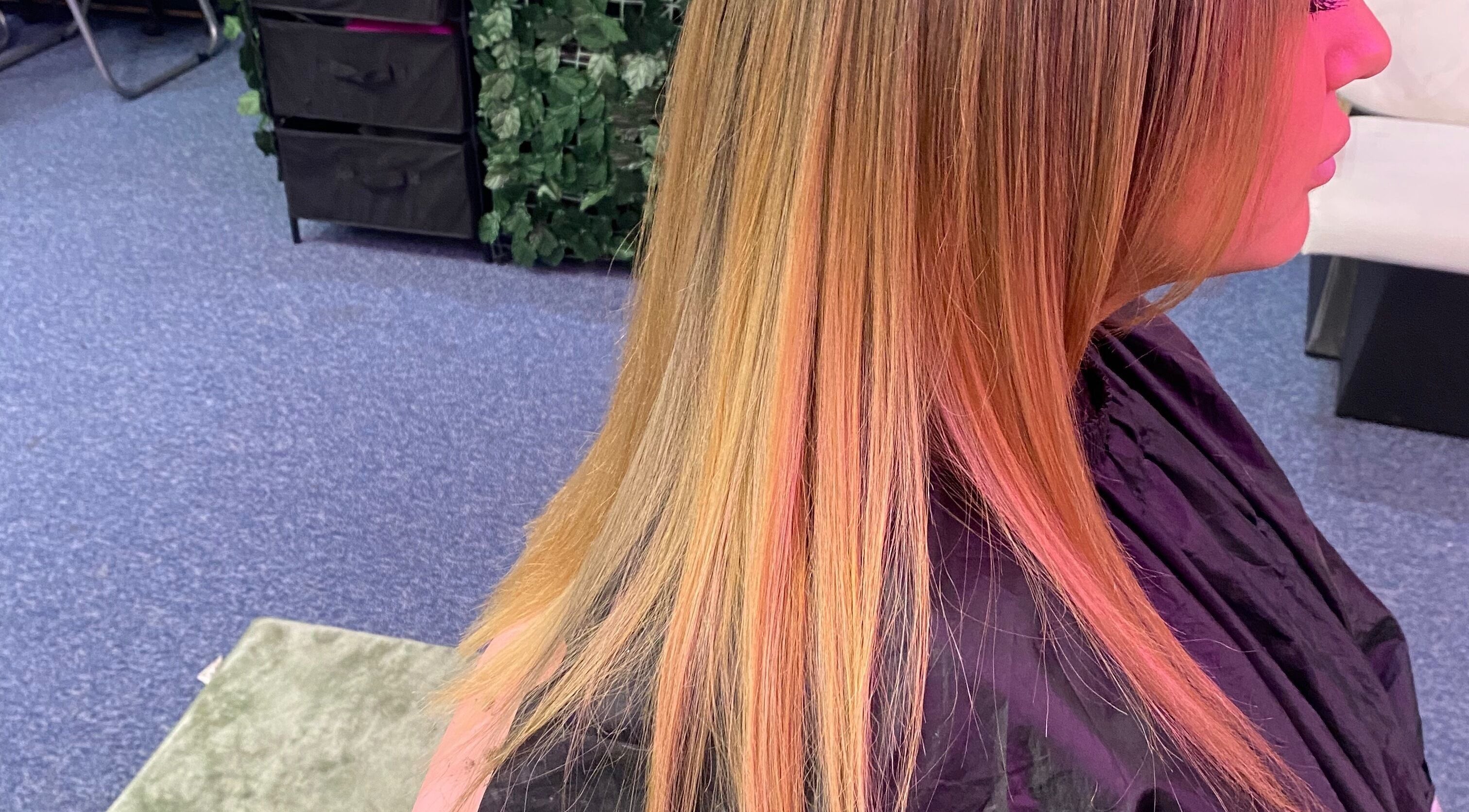 Shiny straight hair styled at Jungle Hair and Beauty, Romford, England, GB, enhancing salon experience.