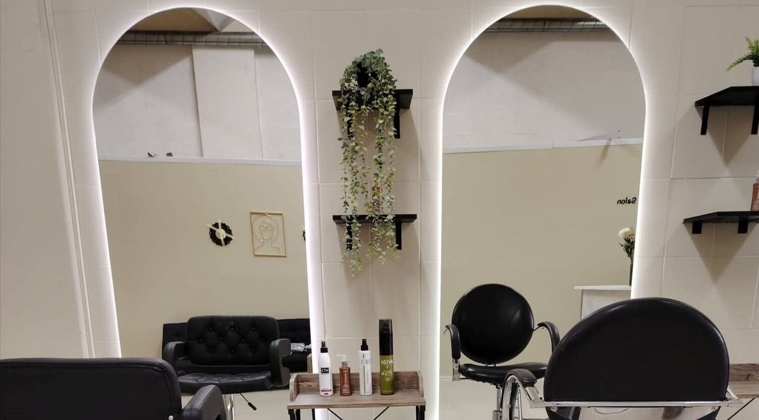 Interior of Nsix Hair & Nail Salon Plumstead with stylish mirrors in Cape Town, Western Cape, ZA.