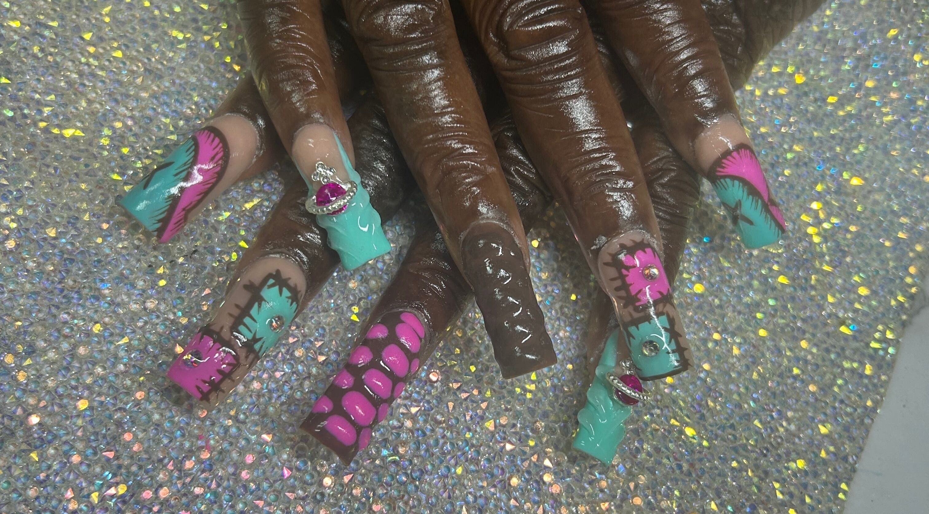 Colorful nail art with gems at Nails by Haylee in Virginia Beach, Virginia, US.