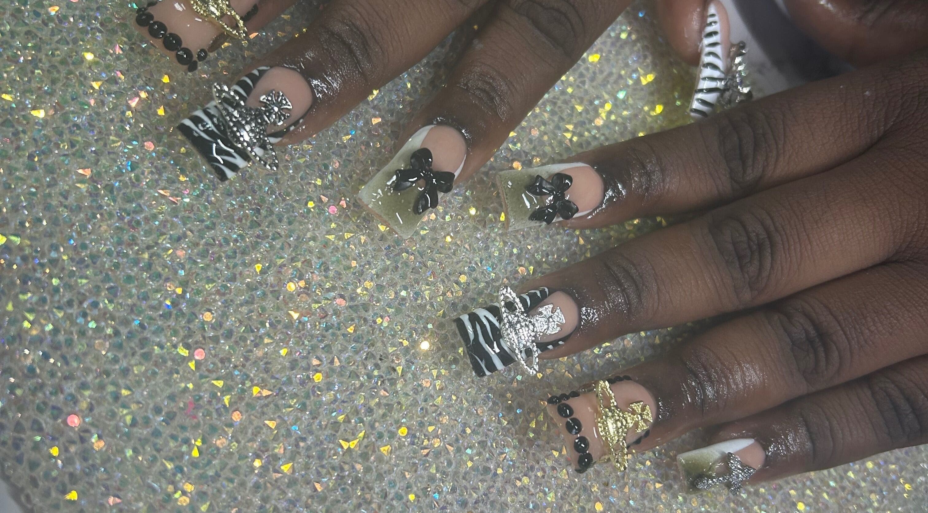 Intricate nail art with bows at Nails by Haylee, Virginia Beach, Virginia, US.
