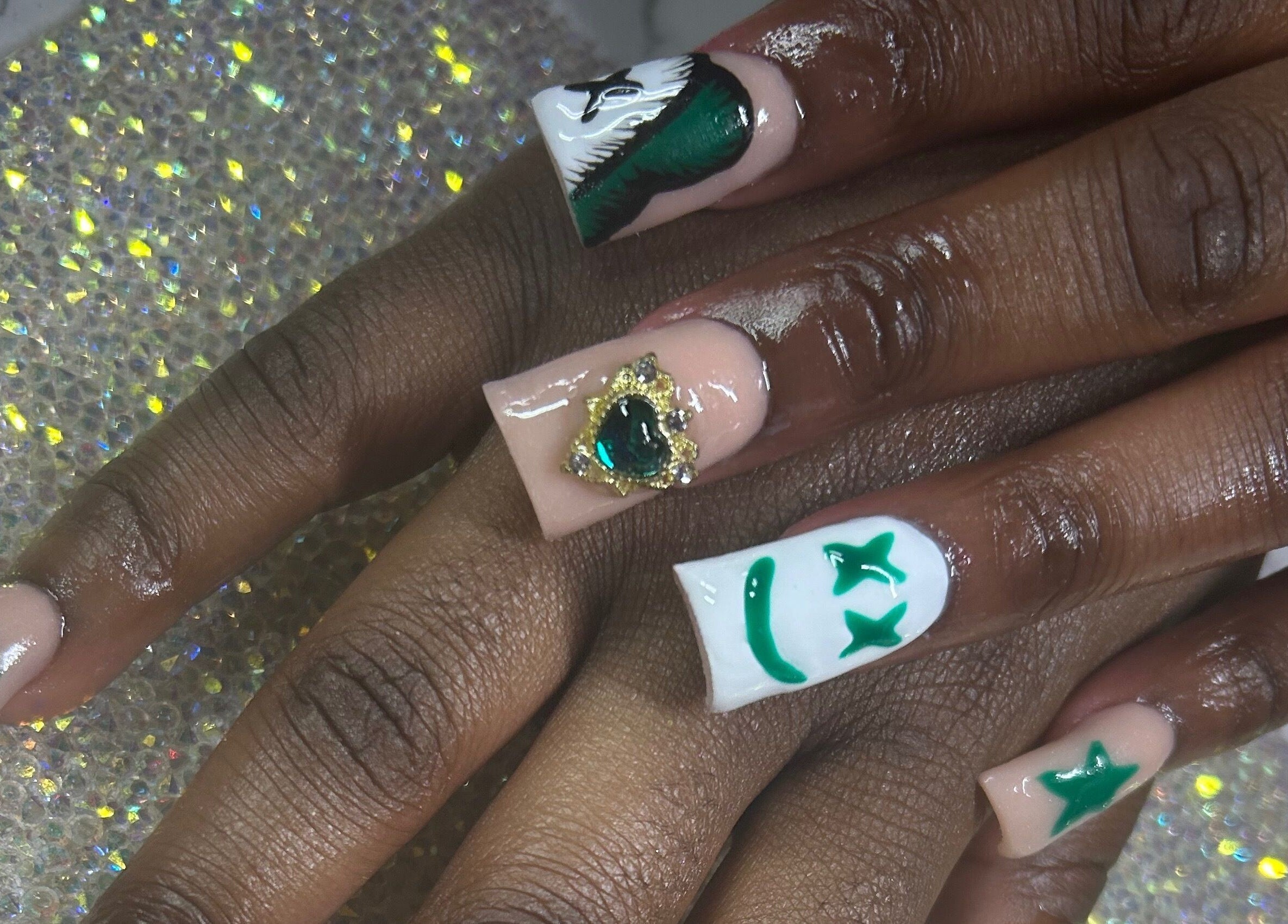 Stylish emerald-themed nail art at Nails by Haylee in Virginia Beach, Virginia, US.