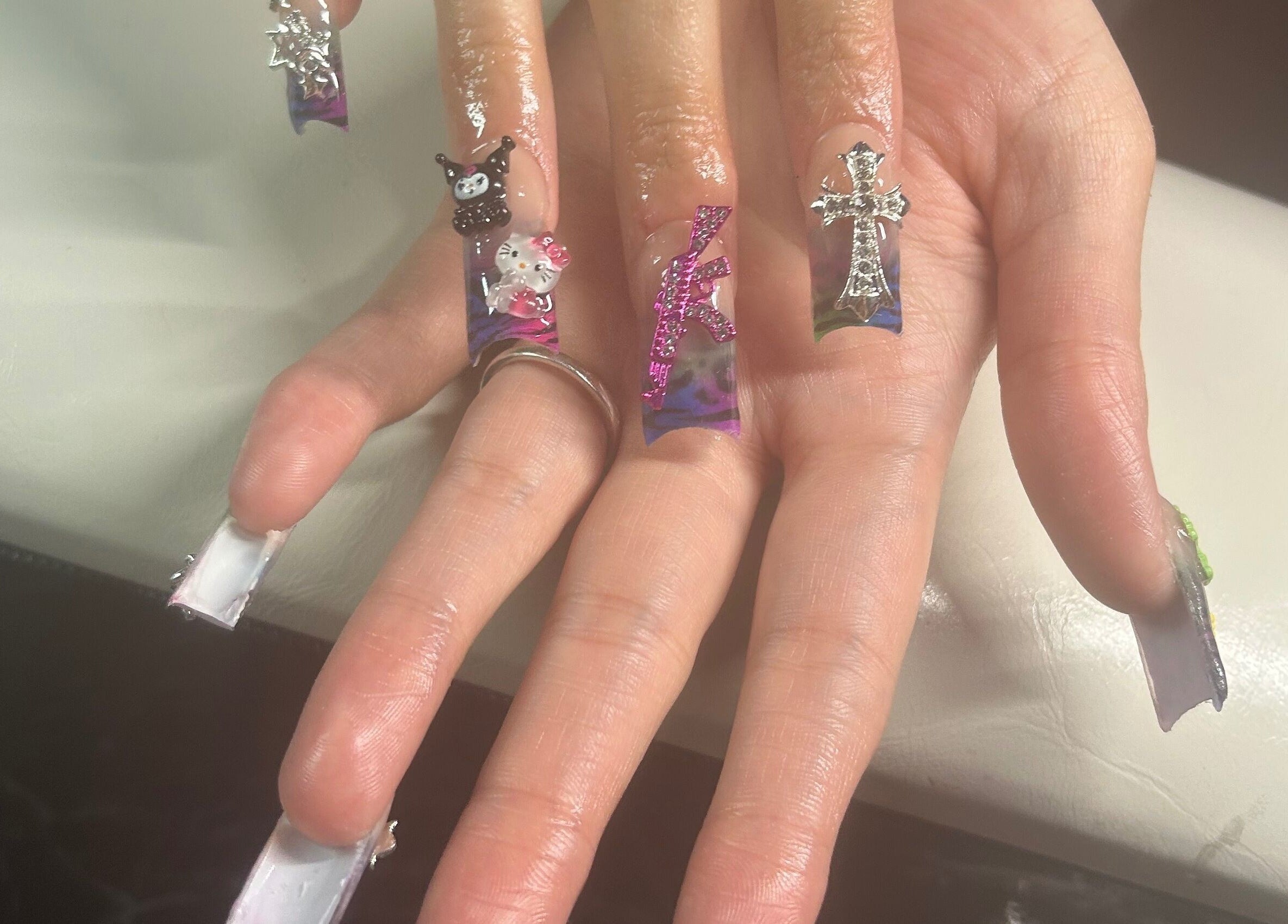Unique nail art with 3D embellishments at Nails by Haylee, Virginia Beach, Virginia, US.