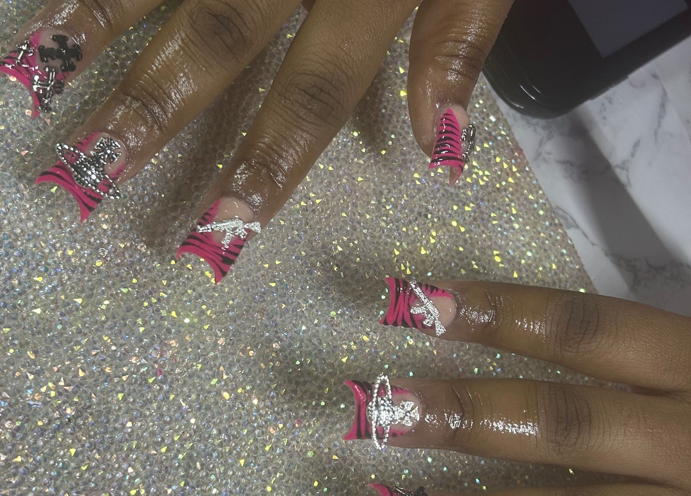 Close-up of stylish pink and black nail art at Nails by Haylee, Virginia Beach, Virginia, US.