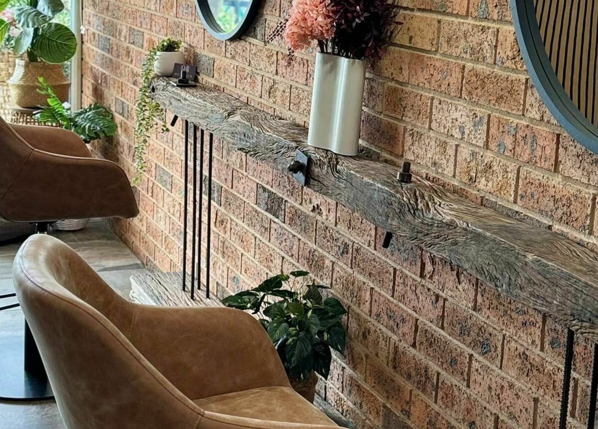 Rustic chic interior at Outback Hair & Beauty Goulburn in Goulburn, New South Wales, AU showcasing elegant chairs.