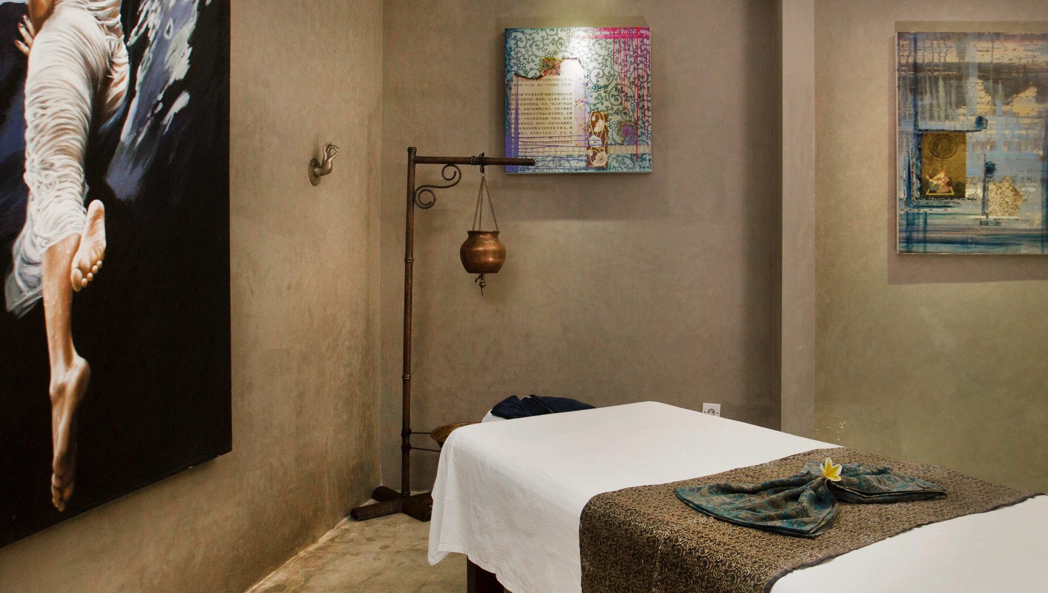 Tranquil massage room at Mudara Spa, Bali, Bali, ID with soothing decor and serene ambiance.