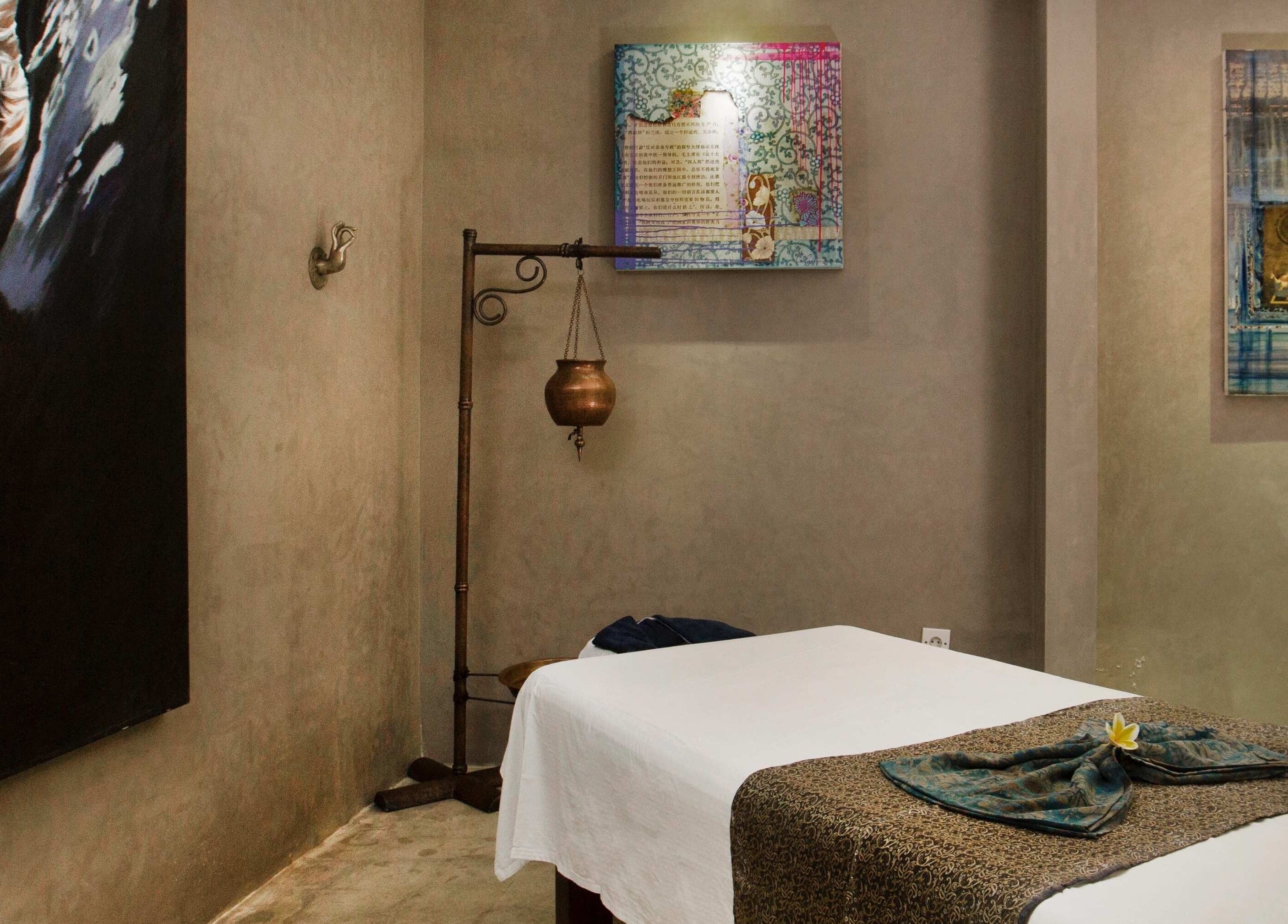 Tranquil massage room at Mudara Spa, Bali, Bali, ID with soothing decor and serene ambiance.