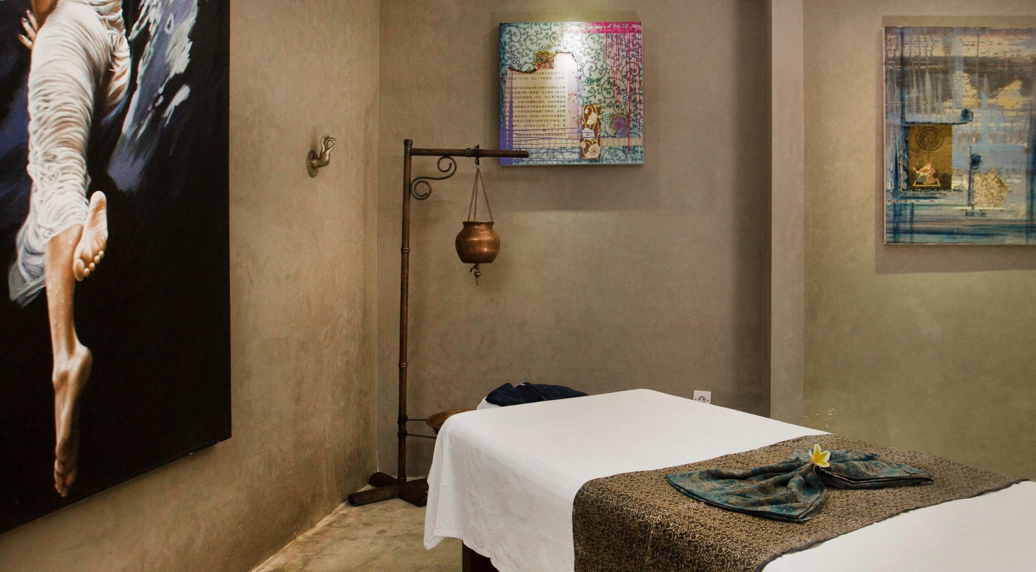 Tranquil massage room at Mudara Spa, Bali, Bali, ID with soothing decor and serene ambiance.