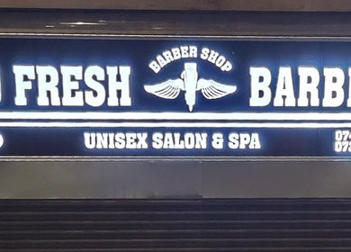 So Fresh Afro Barber signboard at Bolton, England, GB unisex salon and spa.