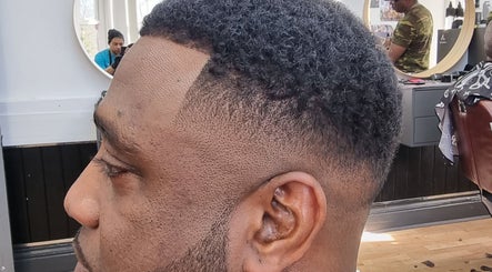 Close-up of a stylish haircut at So Fresh Afro Barber, Bolton, England, GB, showcasing expert fade skills.