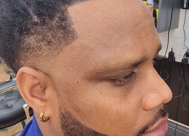 Close-up of a sharp fade haircut at So Fresh Afro Barber, Bolton, England, GB.