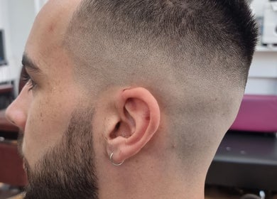 Close-up of a fade haircut at So Fresh Afro Barber, Bolton, England, GB showcasing precise grooming.