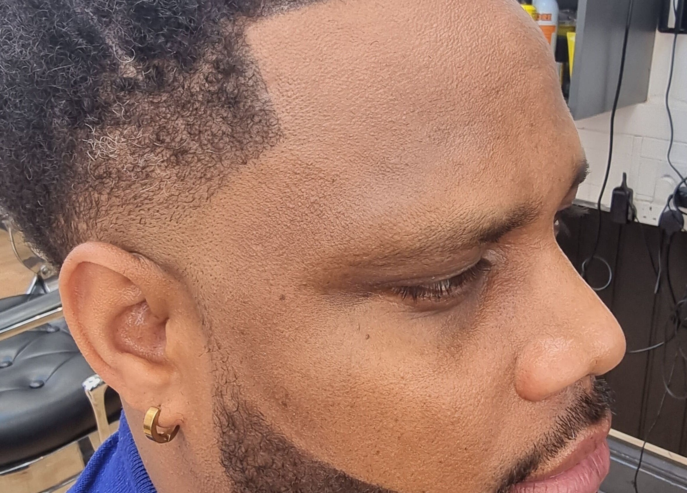 Close-up of a stylish fade haircut at So Fresh Afro Barber, Bolton, England, GB.