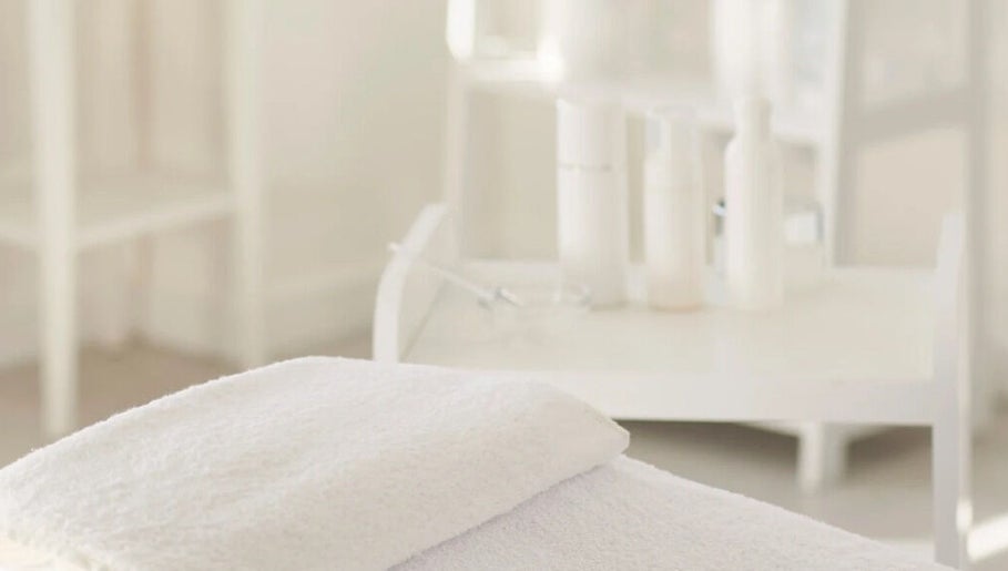 Luxurious spa setting at Sultan Beauty, Melbourne, Victoria, AU with plush towels and serene decor.