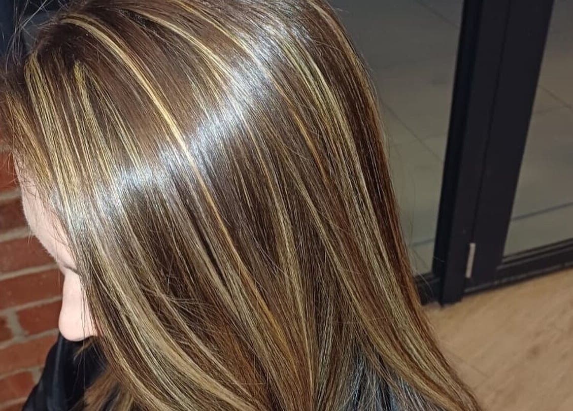 Hair highlights at Ilze at Makeup Madonna, Wellington, Western Cape, ZA, showcasing glossy brown and blonde tones.