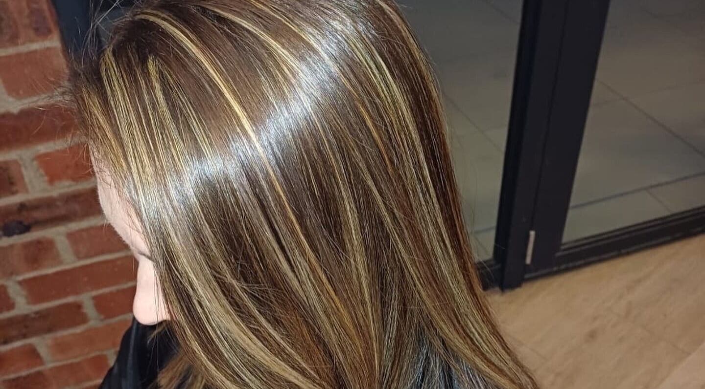 Hair highlights at Ilze at Makeup Madonna, Wellington, Western Cape, ZA, showcasing glossy brown and blonde tones.