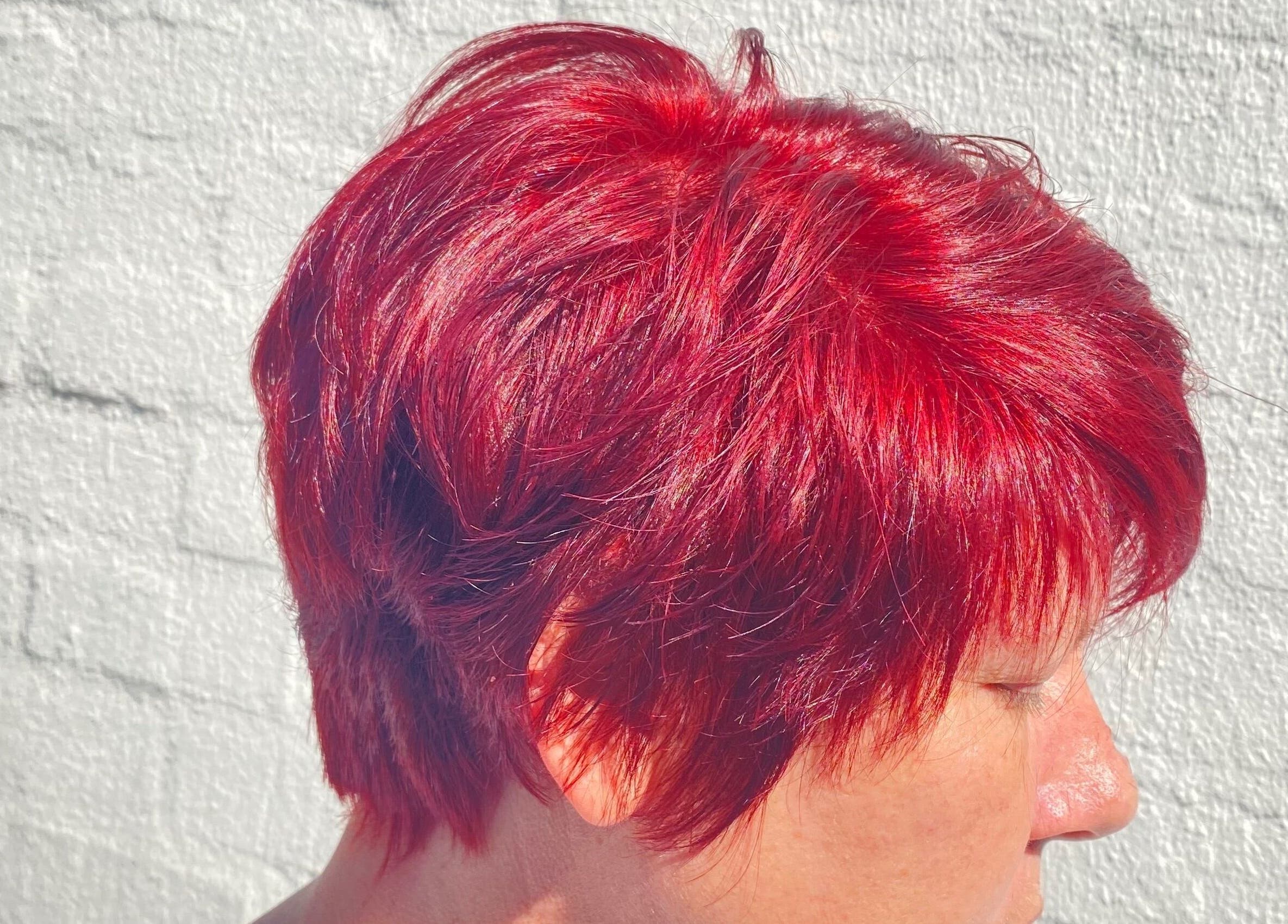 Vibrant red hair styling at Ilze at Makeup Madonna, Wellington, Western Cape, ZA.